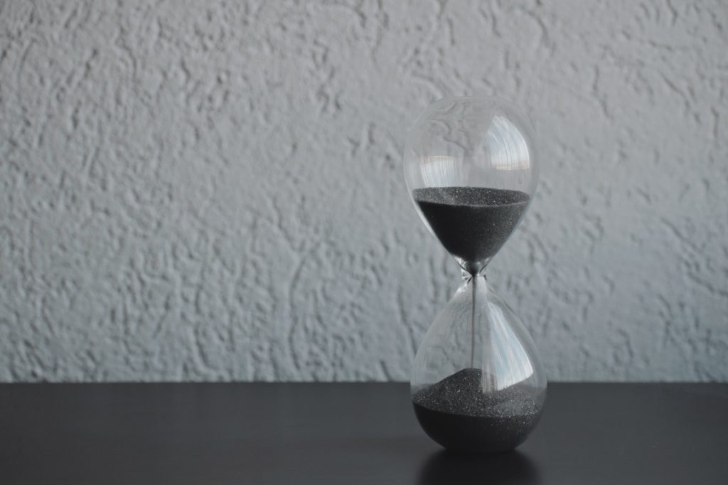 Hourglass with black sand